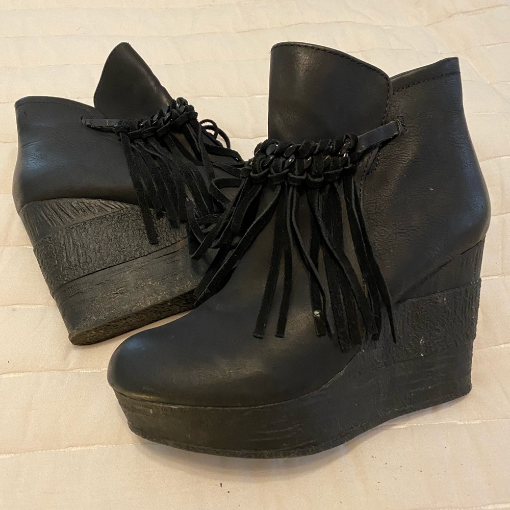 Black wedge booties with fringe on front size 6.5.